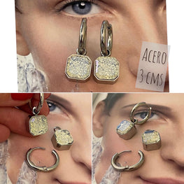 Aros Hippie Chic de acero inoxidable plateado y cristales transparentes.