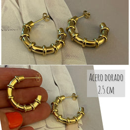 Aros Hippie Chic de acero inoxidable dorado con detalles de circulos en su contorno